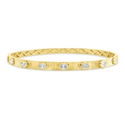 Armreif aus 750 Gelbgold 7 Diamanten Oval-Schliff 0,73ct TW-SI 47x56mm