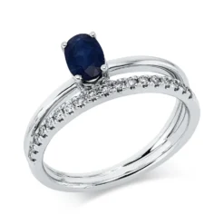 Ring aus 585 Weißgold Saphir 0,61ct blau 18 Brillanten 0,16ct W-SI B:6mm